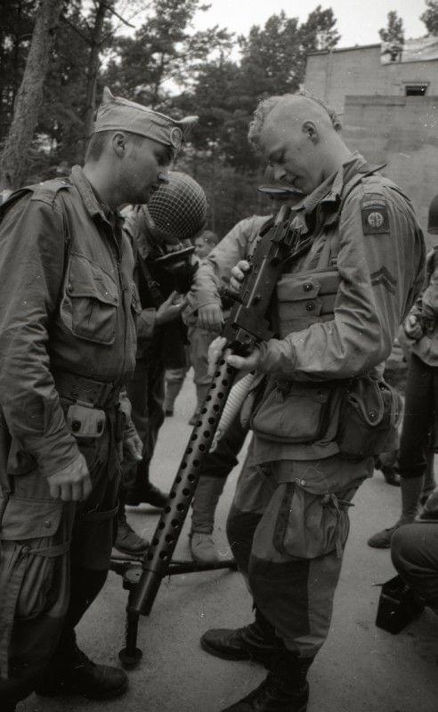 Lt. Jones inspecting Pfc. and his .30 Cal